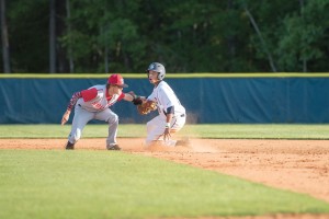 Blythewood’s Jordyn Adams slides around the tag from T.J. White and looks in for the call. (Photo/Kristy Kimball Massey)