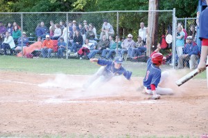Matt Taylor races in from the mound to cover the plate, but is too late with the tag. (Photo/Martha Ladd)