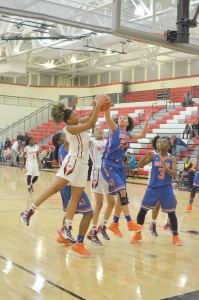 Maliyah Lockett (11) battles for the rebound. (Photo/DeAnna Robinson)