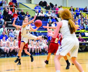 Alyssa Atkerson (11) dishes the ball inside to Marion Walker Coleman during Saturday's SCISA Class A title game vs. Dorchester. (Photo/Ross Burton)