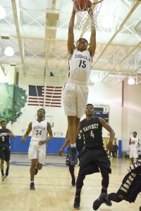 Khalil Shakir-Harris (15) with the two-handed jam. (Photo/Kristy Kimball Massey)