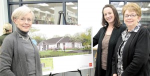 Architect Jennifer Charzewski, Associate Principal of Liollio Architecture of Charleston, explains the firm’s final plans for the Blythewood Library renovation to Shirley Carter, Manager of the Library, left, and Library Associate June Smith, right, during the unveiling of the plans at the library earlier this month. (Photo/Barbara Ball)