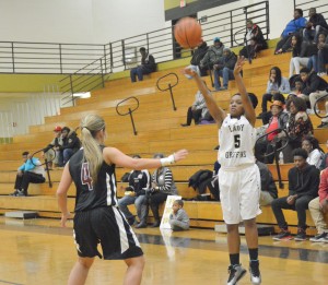 Nyashia Crumblin launches a long-ball for the Lady Griffins. (Photo/Joe Seibles)