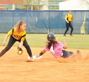 Maggie Herrera (4) slides safely into second during game 1 Friday. (Photo/DeAnna Robinson)