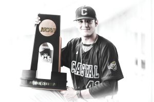 Blythewood’s Andrew Beckwith and the national championship trophy he helped Coastal Carolina’s baseball squad bring home last week from Omaha.