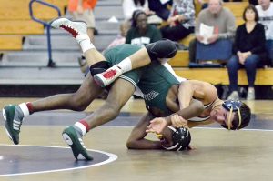 Blythewood's Mason Marshall (in white) works for the pin in last week's loss to Spring Valley. (Photo/Kristy Kimball Massey)